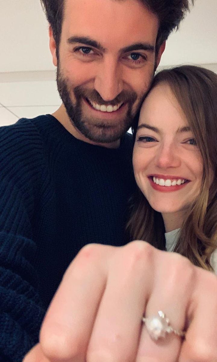 Emma Stones shows engagement ring with fiancé Dave Mccary