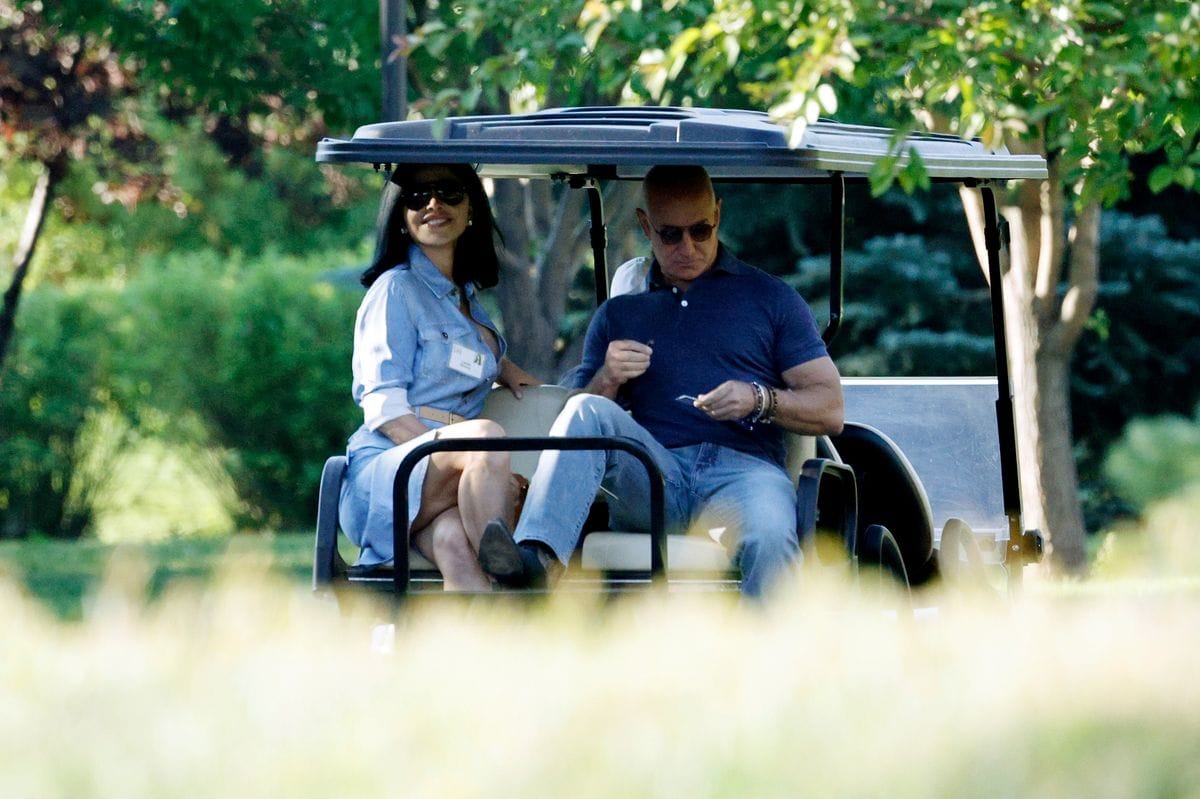 Jeff Bezos, founder of Amazon.com Inc., and Lauren Sanchez arrive for the morning session at the Allen & Company Sun Valley Conference on July 11, 2024, in Sun Valley, Idaho. The annual gathering organized by the investment firm Allen & Co. brings together the world's most wealthy and powerful figures from the media, finance, technology, and political spheres at the Sun Valley Resort for the exclusive weeklong conference. 