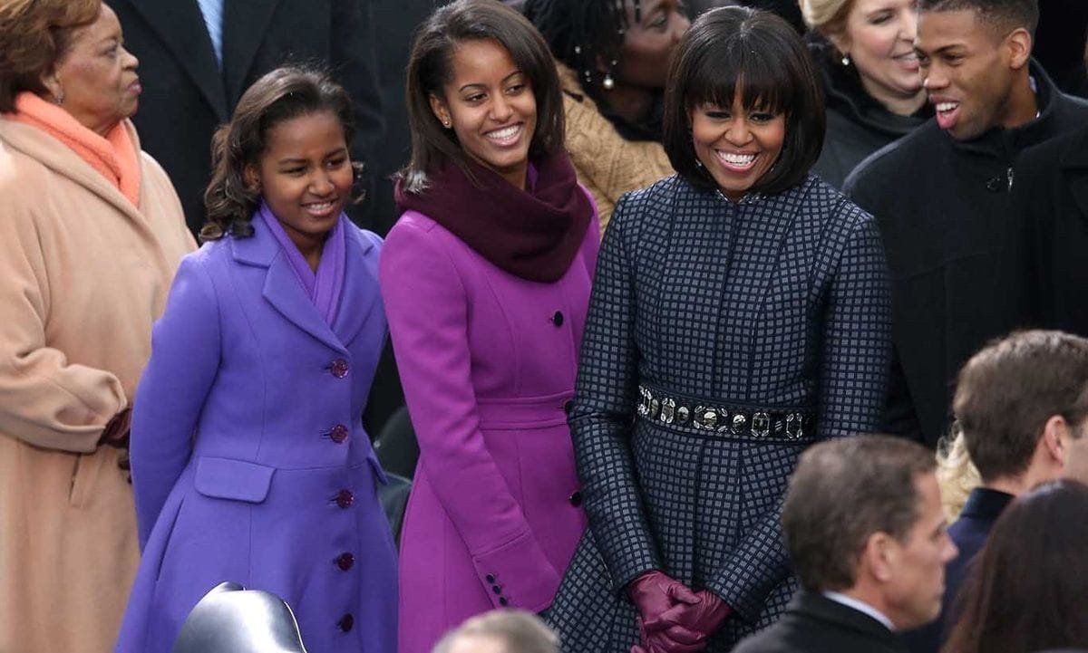 January 2013: Sasha, Malia and their mother Michelle nailed the inauguration fashion for a second time in complementing coats.
<br>
Photo: Getty Images