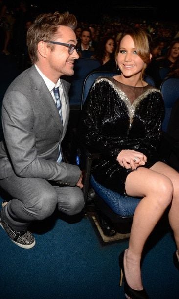 Robert Downey Jr. knew to pop a squat near Jennifer for a fun chat at the People's Choice Awards in January 2013. Both actors took home a number of awards, he for 'Iron Man' and she for 'The Hunger Games.'
<br>
Photo: Getty Images