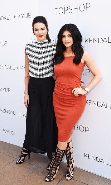 At the launch of their line with Topshop, Kendall and Kylie donned similar pairs of heels. Kendall chose a monocrome color scheme. Kylie, with a form-fitting dress, looked like older sis Kim Kardashian more than ever.
<br>
Photo: Getty Images