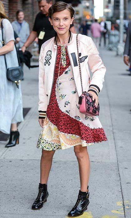 As she arrived for a taping of <I>The Late Show With Stephen Colbert</I> at the Ed Sullivan Theater, the actress sported a blush pink bomber with a patterned dress and fierce studded booties.
Photo: Ray Tamarra/GC Images