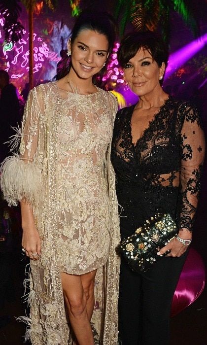 Kendall Jenner and her mom Kris took a walk on the wild side wearing daring white and black attires at the Chopard Wild Party.
<br>
Photo: Getty Images