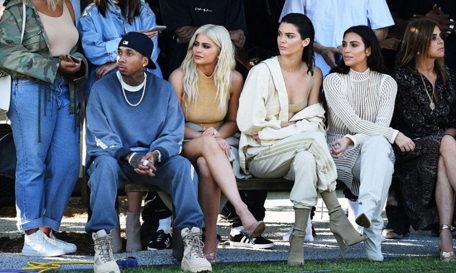 Despite starting late, Kim and her family watched the models including Sofia Richie and Chanel Iman walk as regulars were cast to stand in the middle of the field for the duration of the show.
Photo: Jamie McCarthy/Getty Images for Yeezy Season 4