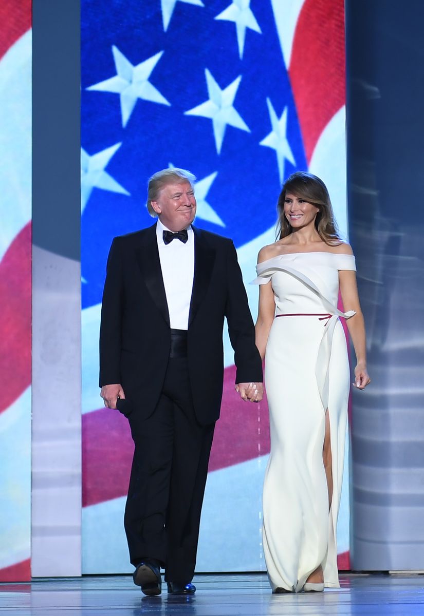 US President Donald Trump and first lady Melania Trump arrive at the Freedom Ball at the Washington DC Convention Center following Donald Trump's inauguration as the 45th President of the United States, in Washington, DC, on January 20, 2017.  / AFP / JIM WATSON        (Photo credit should read JIM WATSON/AFP via Getty Images)