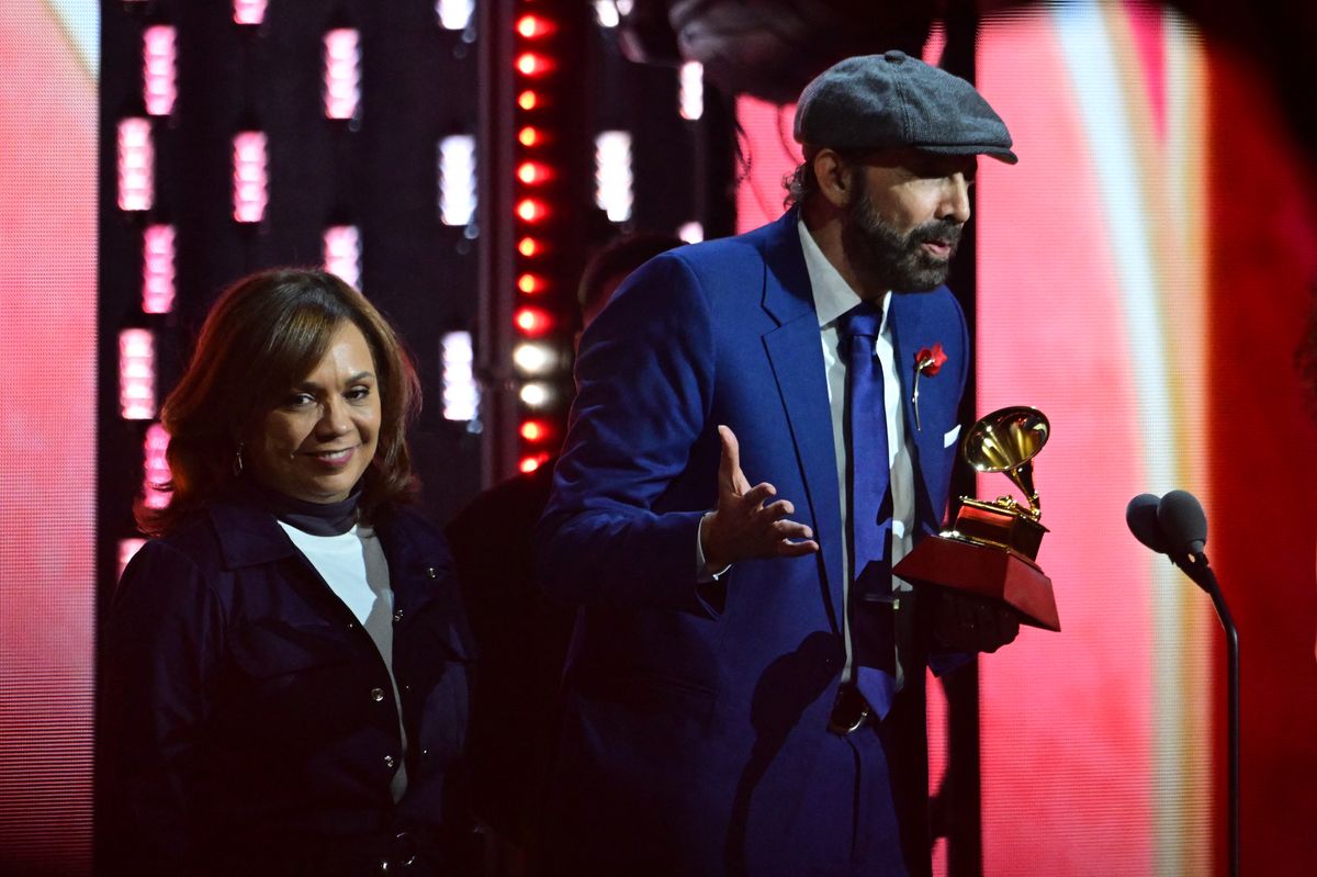 Dominican singer and composer Juan Luis Guerra accepts the award for Album of the Year 