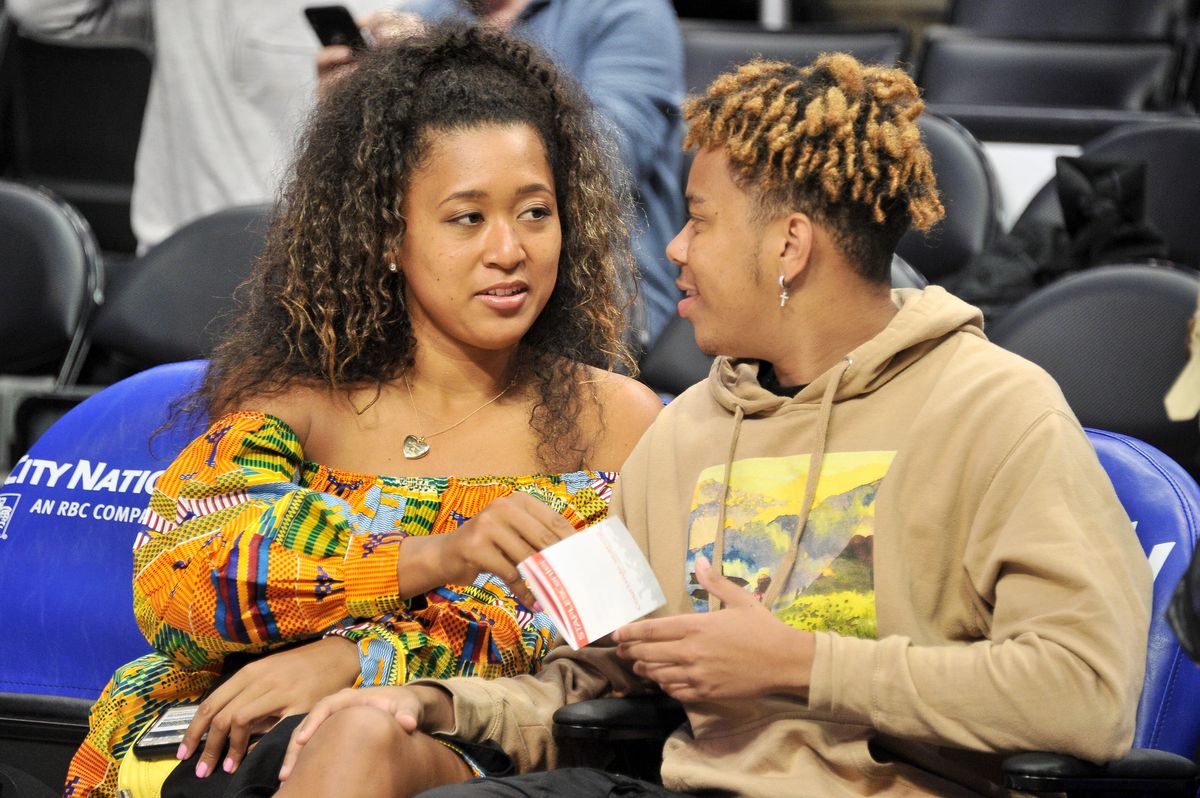 Naomi Osaka and YBN Cordae attend a basketball game between the Los Angeles Clippers and the Washington Wizards 