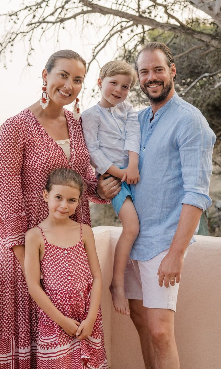 Princess Amalia twinned with her mom wearing matching red and white dresses, while Prince Felix and his son sported shorts and and shirts for the family snapshot.