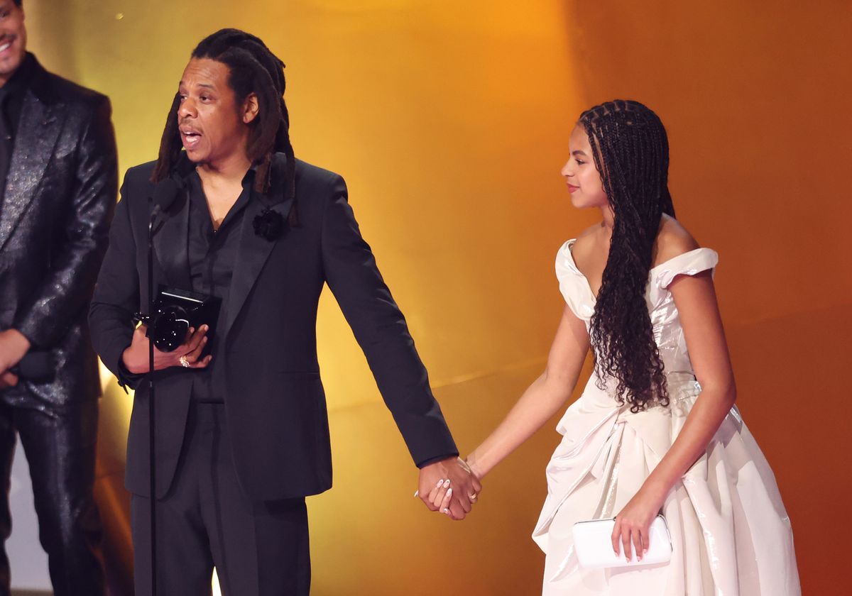 Jay-Z and Blue Ivy Carter accepting an award at the Grammys