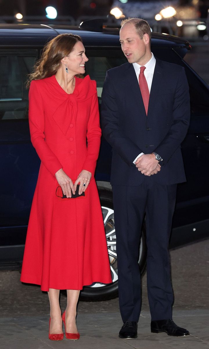 The host of the evening, the Duchess of Cambridge, looked merry and bright in a red coat by Catherine Walker as she arrived with her husband Prince William. It was previously announced that the Duke will deliver a reading at the