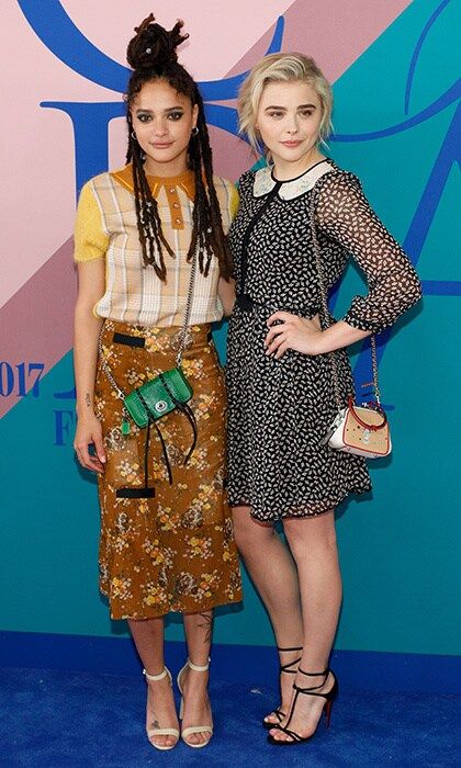 Sasha Lane, left, and Chloe Grace Moretz, both wearing looks by Coach 1941.
Photo: Getty Images