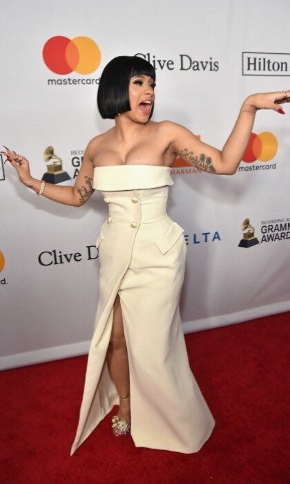 No doubt making some of her famous sounds, Cardi B worked the Times Square red carpet in style. The "Bodak Yellow" singer flaunted a fantastic figure in an elegant cream-coloured tuxedo-style gown. Cardi also showed off her $500,000 engagement ring from Offset to the crowd of photographers.
Photo: Getty Images