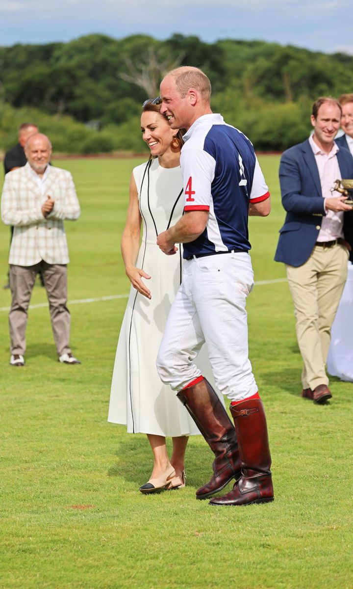 The Duke and Duchess were all smiles after their PDA moment.