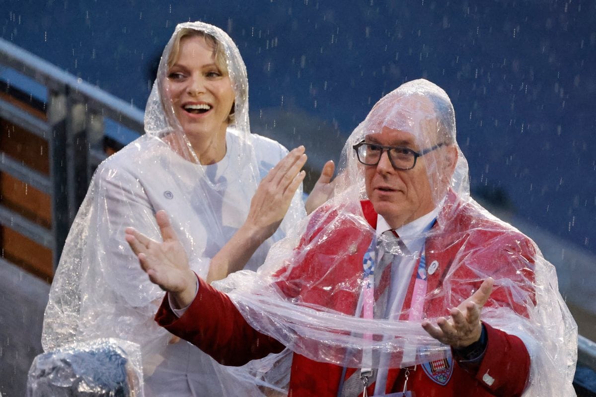 Prince Albert II of Monaco (R) and Princess Charlene of Monaco attend the opening ceremony of the Paris 2024 Olympic Games in Paris on July 26, 2024. (Photo by Ludovic MARIN / POOL / AFP) (Photo by LUDOVIC MARIN/POOL/AFP via Getty Images)
