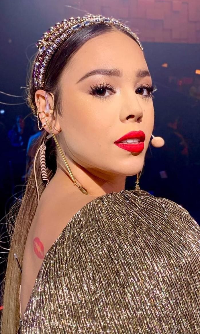 Danna Paola with makeup starring red lips