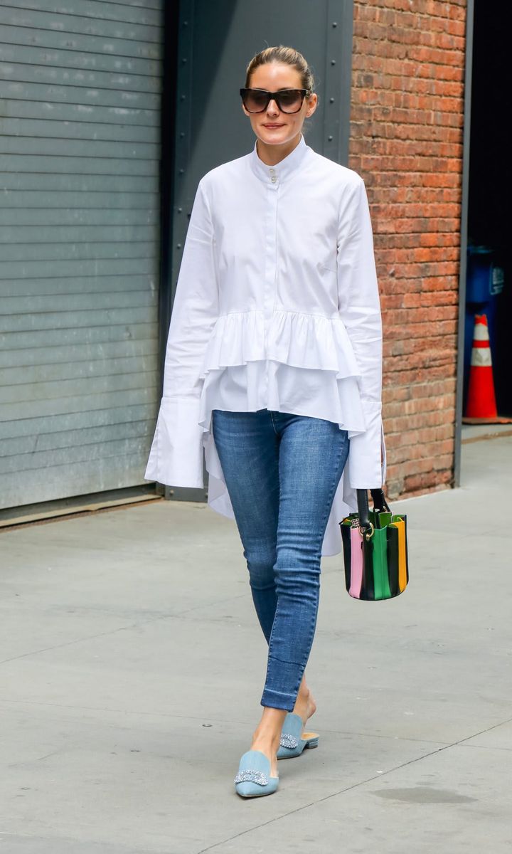 Olivia Palermo in Pretty White Blouse & Skinny Jeans Drinks Ice Coffee in Dumbo NY