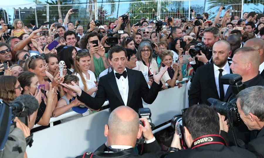 Ever the joker! Comedian Gad Elmaleh feigned shock at the attention he was receiving from fans and the media. Charlotte Casiraghi's ex-boyfriend was walking the red carpet for the premiere of the new French film <i>Elle</i>.
<br>Photo: Getty Images