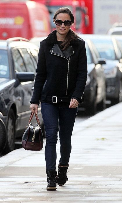 Pippa went moto-cool in dark wash skinny jeans and a black wool-and-leather jacket.
<br>
Photo: Getty Images
