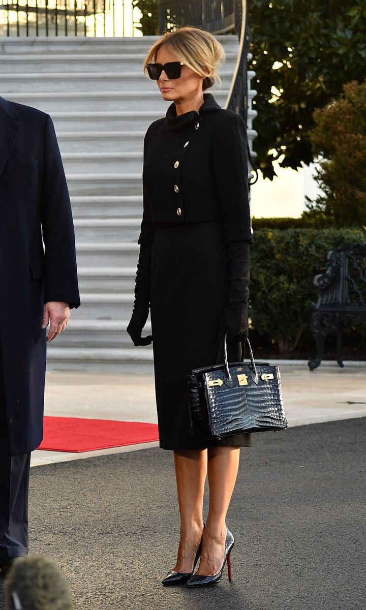 Melania wore a Chanel jacket and Dolce & Gabbana dress as she left the White House on Jan. 20