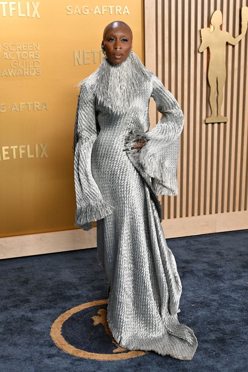 Cynthia Erivo wearing a silver textured vintage Givenchy Haute Couture gown with fringe details at the SAG Awards 2025.