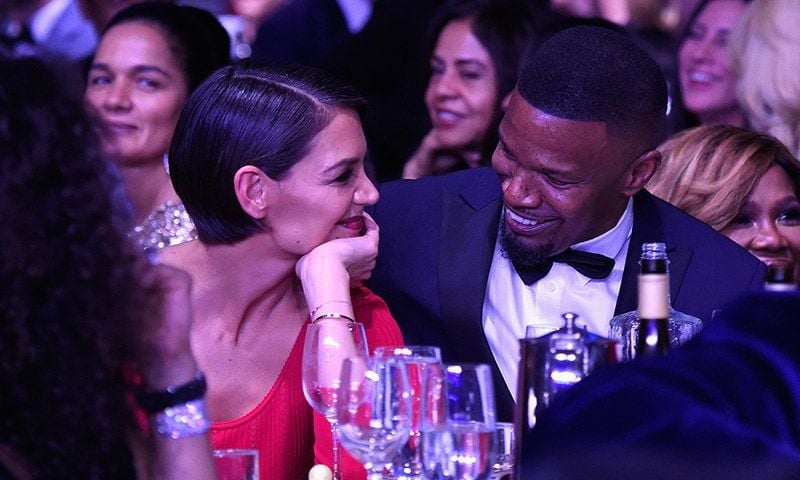 Reports have long been swirling that Katie Holmes and Jamie Foxx are together, but the couple's romance was finally on full display at Clive Davis's GRAMMY bash. The couple looked cozy and shared lots of laughs at the star-studded party.
Photo: Getty Images