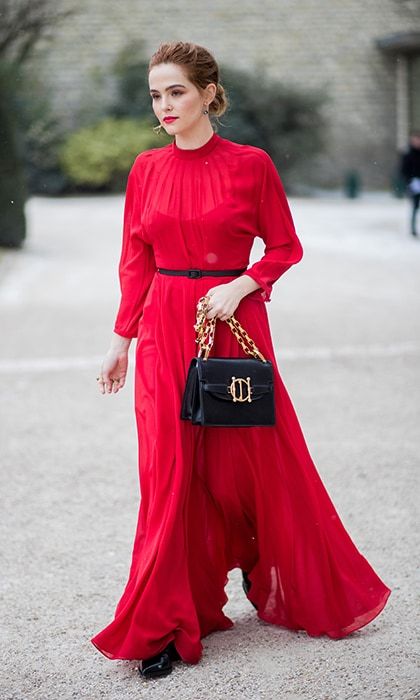 Actress Zoey Deutch was a lady in red toting a must-have Dior bag on February 27.
Photo: Christian Vierig/Getty Images