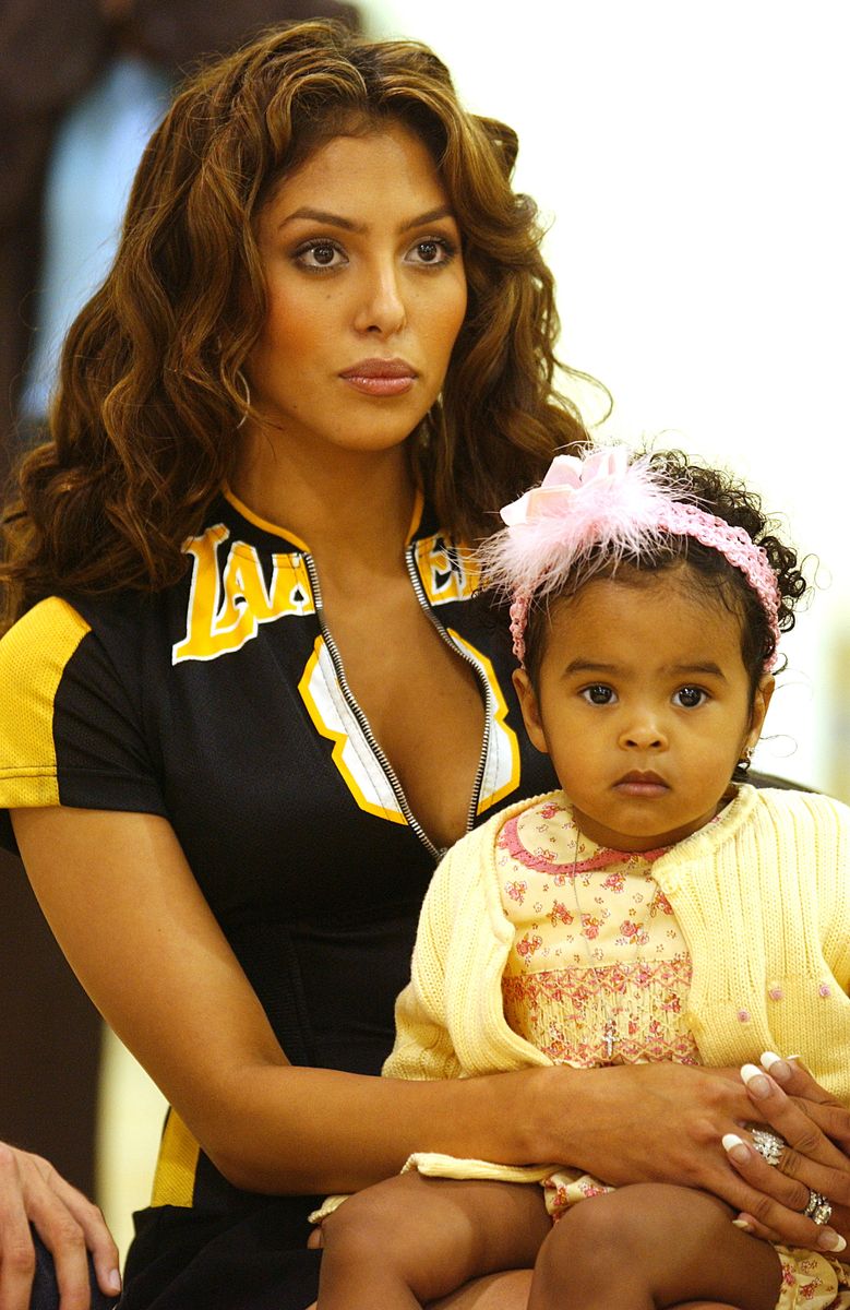 Vanessa Bryant and their daughter Natalia, listen to Kobe speak at a press conference 