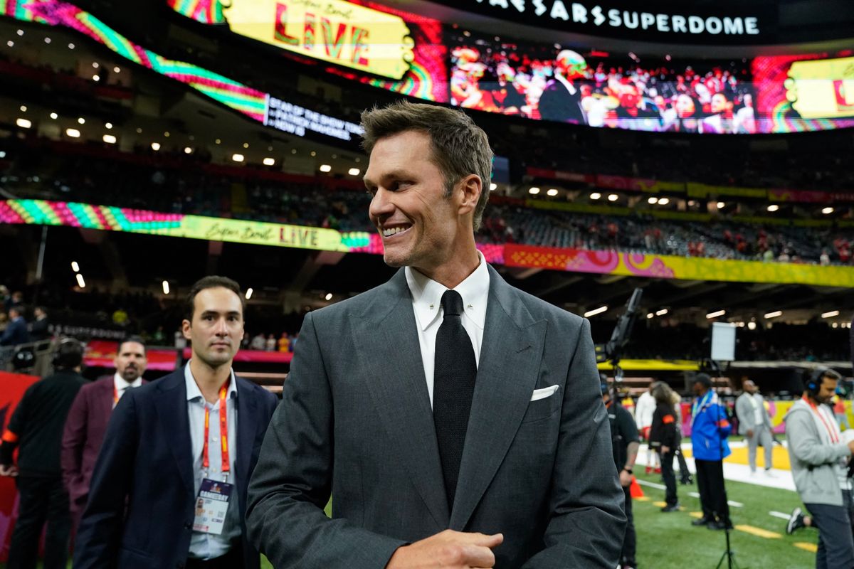 Retired football player and Fox analyst Tom Brady walks the sidelines before the start of Super Bowl LIX between the Kansas City Chiefs and the Philadelphia Eagles at Caesars Superdome in New Orleans, Louisiana, February 9, 2025. (Photo by TIMOTHY A. CLARY / AFP) (Photo by TIMOTHY A. CLARY/AFP via Getty Images)          