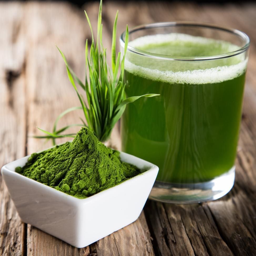 Chlorella Spirulina in a small dish and a drink