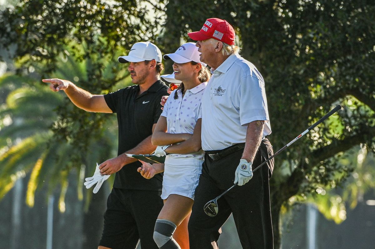 Former President Donald Trump and Kai pictured on a golf course in 2022