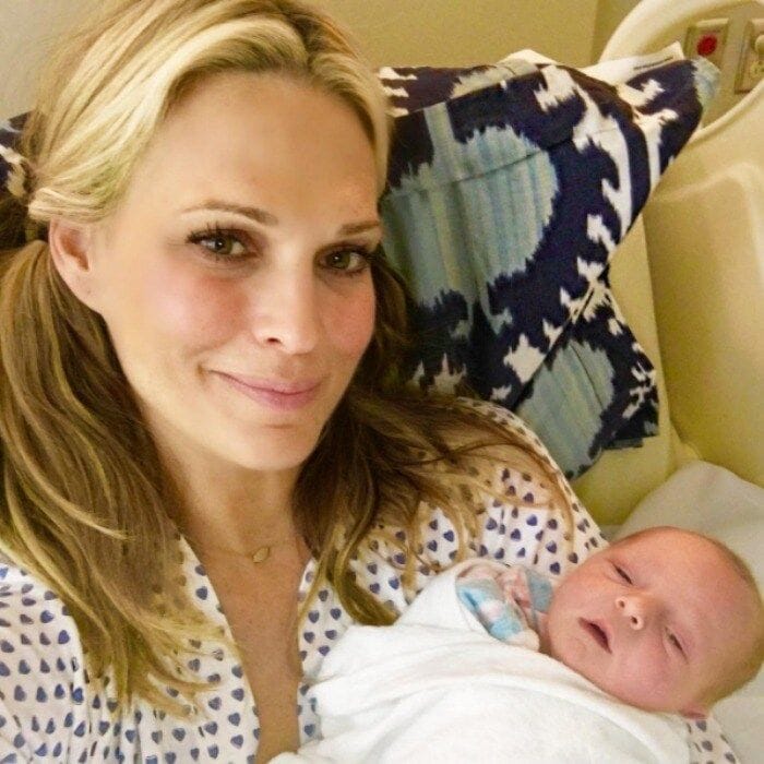 Welcome to the world, and Instagram! Molly Sims and Scott Stuber's third little bundle got a very formal introduction to the world of social media.
The model, who gave birth to her son on January 10, 2017, showed off the adorable little boy in a post with all of his little stats.
"Welcome to the world Grey Douglas Stuber 1.10.17 Words do not express how grateful and happy we are to have another piece of magic added to our little tribe! #blessed tribeof5."
Photo: Instagram/@mollybsims