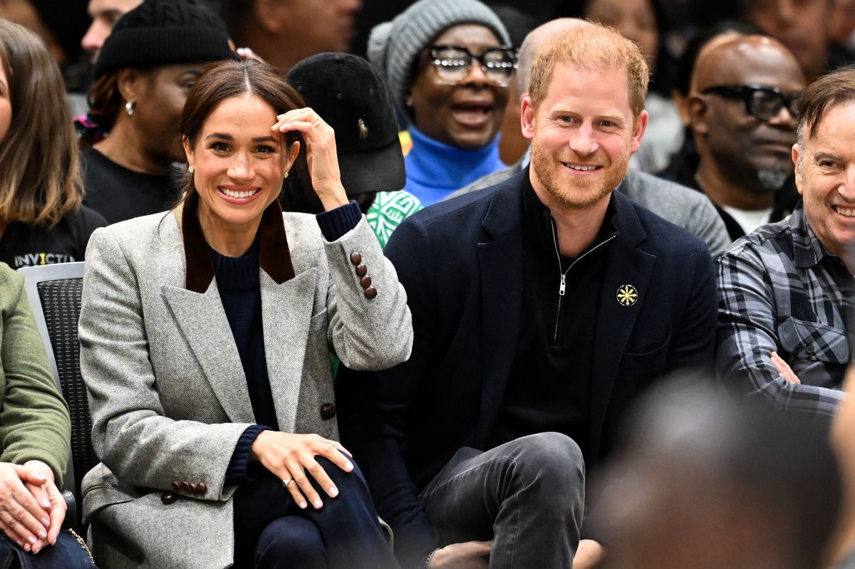 VANCOUVER, BRITISH COLUMBIA - FEBRUARY 09: Meghan, Duchess of Sussex and Prince Harry, Duke of Sussex attend the wheelchair basketball match between the USA v Nigeria during day one of the 2025 Invictus Games at the Vancouver Convention Centre on February 09, 2025 in Vancouver, British Columbia. (Photo by Samir Hussein/WireImage)