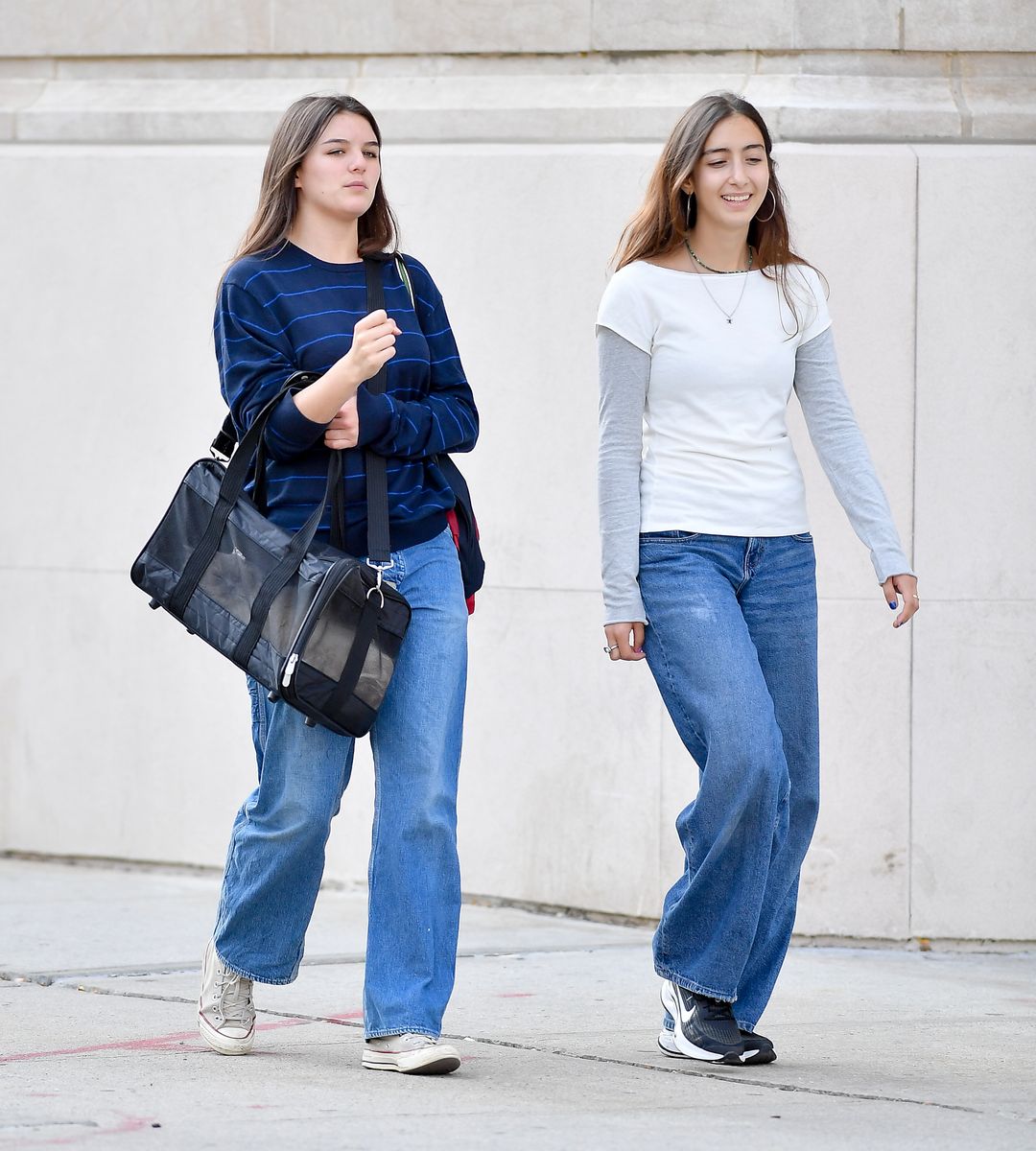 Suri, her cat Eleanor, and a friend in New York