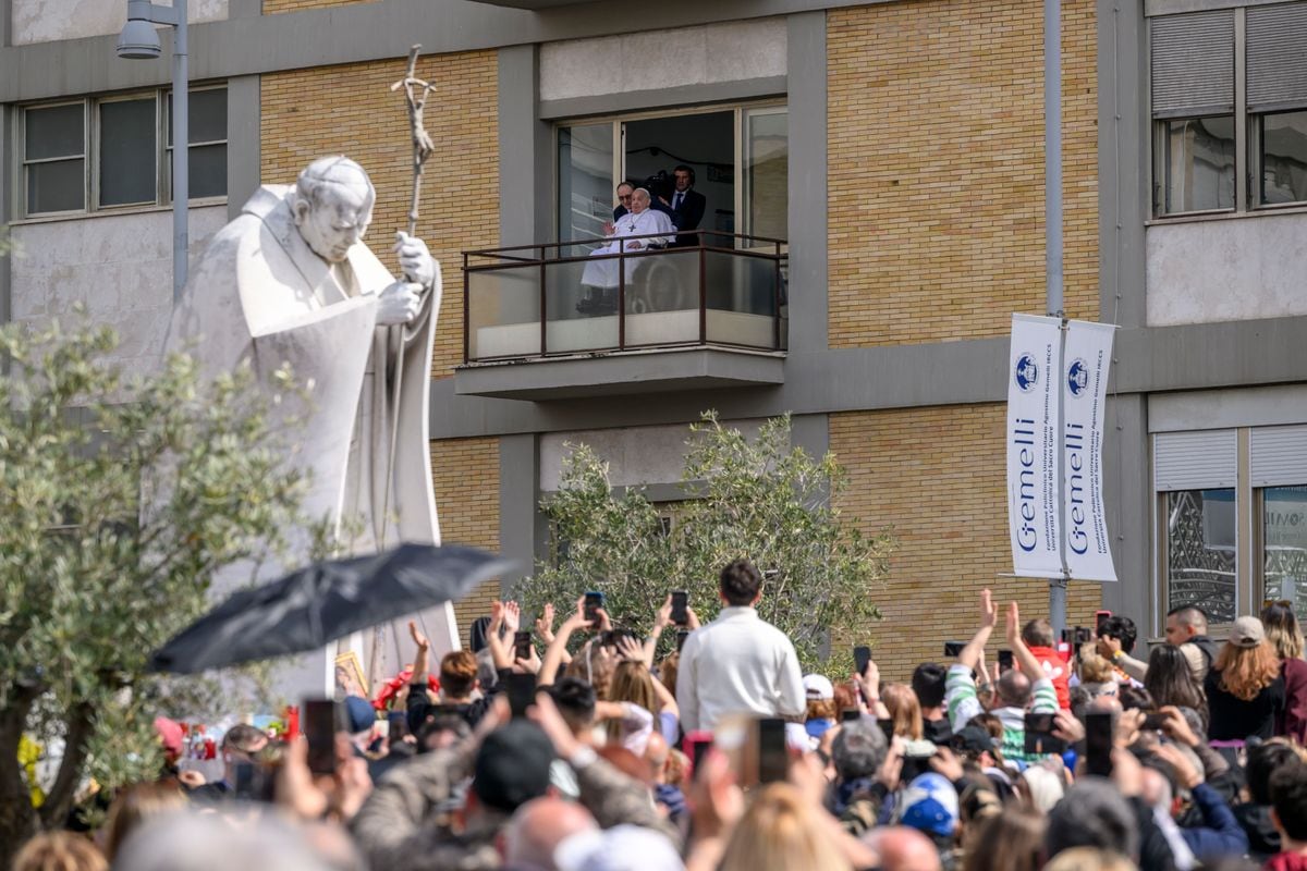 Pope Francis appears on his balcony to speak to the crowds at the Gemelli hospital, the first time he has appeared in public since being admitted to the hospital on March 23, 2025, in Rome, Italy. 