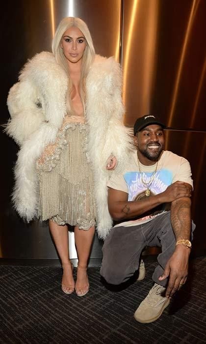 In her first public appearance since giving birth to Saint, Kim looked incredible wearing a nude and silver sequin dress and a white fur coat. To finish off the look, which was put together by Kanye, the reality TV star wore a long platinum blonde wig.
<br>Photo: Getty Images