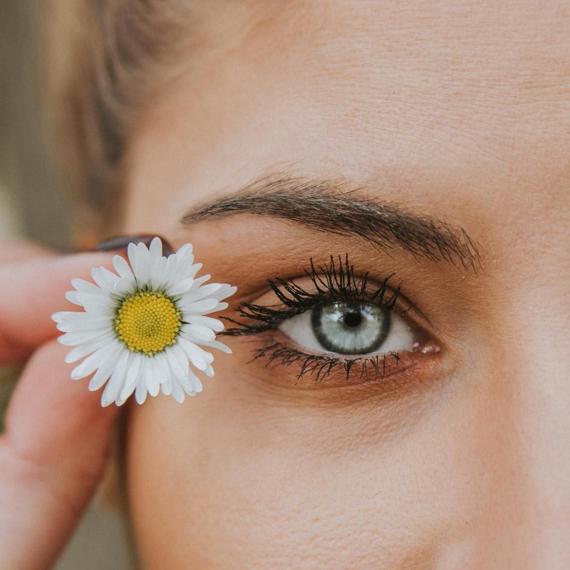 Girl with flower on her hair