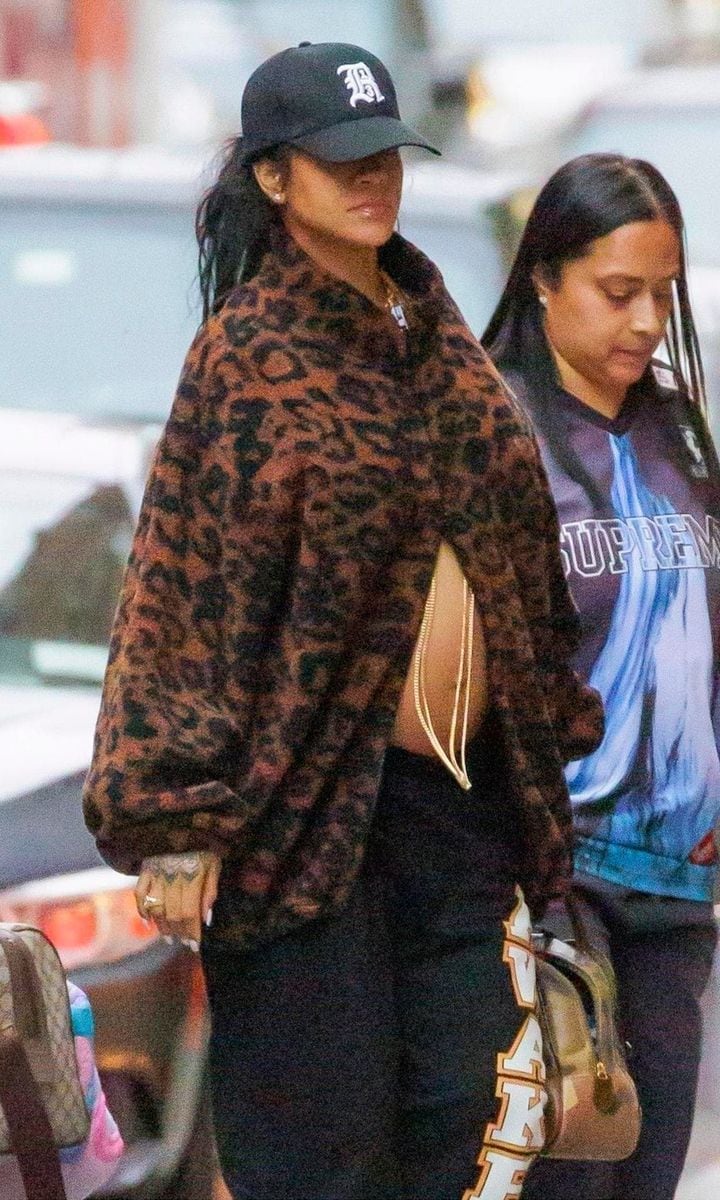 Rihanna Bares Her Baby Bump In A Cozy Leopard Zip Up While Out In NYC