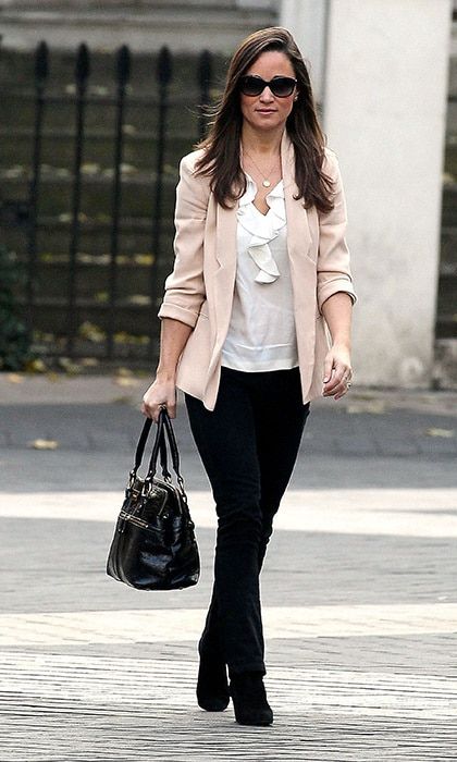 Pippa kept it sweet with a white ruffled blouse, blush pink blazer and black pants while out and about in London.
<br>
Photo: Getty Images