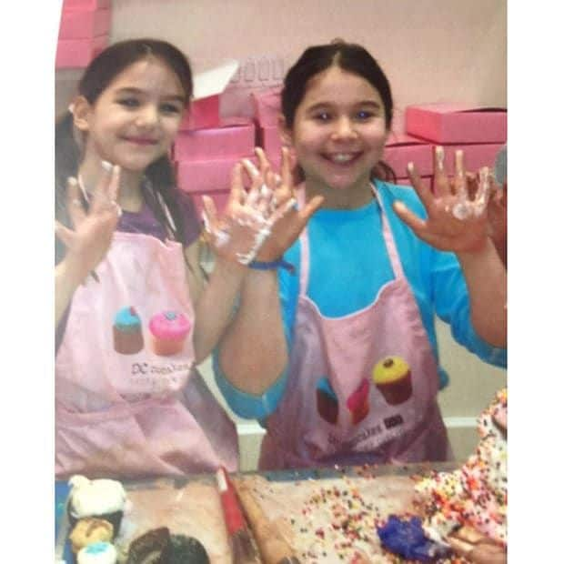 Katie shared a photo of daughter Suri baking with a friend.
Photo: Instagram.com/katieholmes212