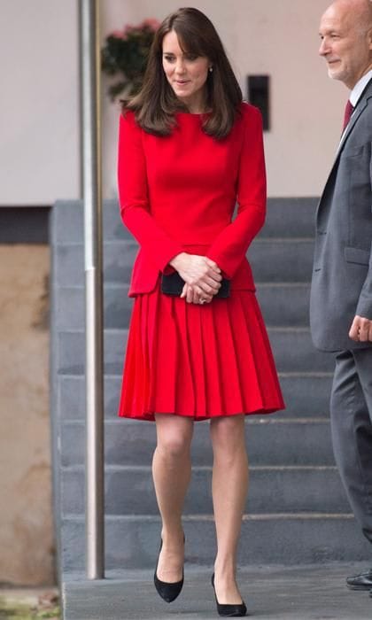 Kate middleton with head to toes red top and skirt