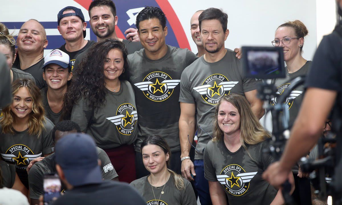 Mark Wahlberg Leads a Fitness Class at His F45 Gym & Coaches Mario Lopez