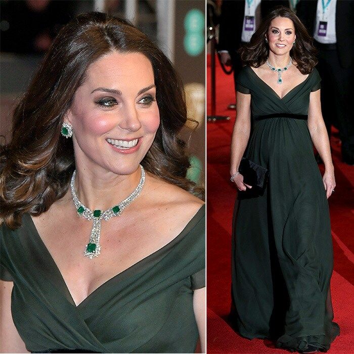 On February 19, 2018, the Duchess of Cambridge was a red carpet star, making a dazzling entrance to the British Oscars the BAFTAs at London's Royal Albert Hall accompanied by Prince William. Duchess Kate, pregnant with their child, wore a forest green empire waist Jenny Packham gown featuring a crossover neckline, cap sleeves and ribbon belt detail. The royal accessorized the beautiful dress with sparkling diamond and emerald jewelry.
Photos: Getty Images