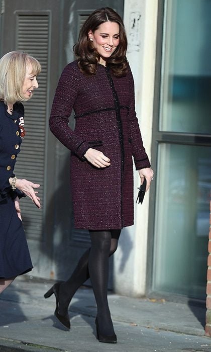 While expecting her third child, the Duchess of Cambridge re-wore the 'Marina' maternity coat that had first been seen while she was pregnant with Princess Charlotte back in 2014. She's wearing the coat here in December 2017 to the 'Magic Mums' community Christmas party held at Rugby Portobello Trust.
Photo: Getty Images