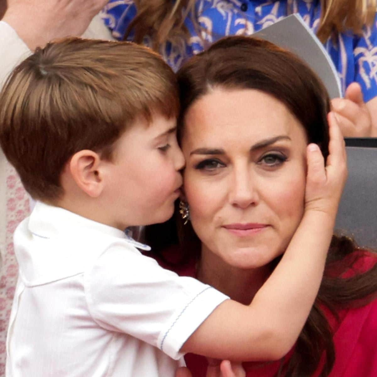 Though he made some faces, the little Prince showed his mom plenty of love too, giving the Duchess of Cambridge a sweet kiss on her cheek.