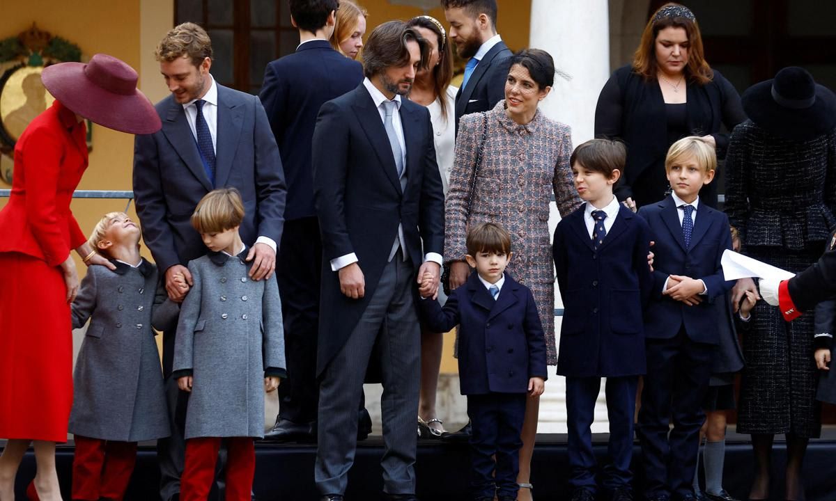 Balthazar, who sported a tie and navy jacket, sweetly held on to dad Dimitri's hand while surrounded by family on Nov. 19. Meanwhile, Francesco was caught smiling up at his mom and dad.