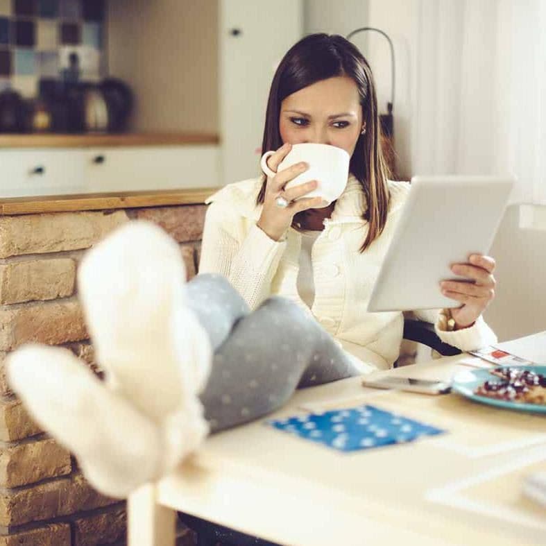 Woman drinking from a mug