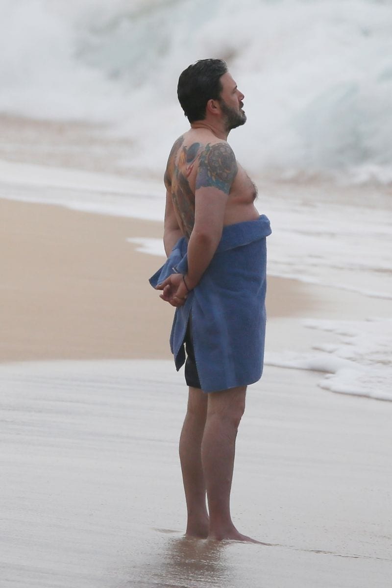 Photo © 2018 Backgrid/The Grosby Group
Spain: Lagencia Grosby

EXCLUSIVE
Honolulu, HI, March 15, 2018. 
Ben Affleck shows off a huge back tattoo while filming "Triple Frontier." Ben was seen getting out of the ocean with life guard equipment as he sports three colorful tattoos: one on each shoulder, and a giant Phoenix on his back. All were seen training under the strict supervision of Hawaii lifeguards as they prepared for their new movie "Triple Frontier" which is being produced for Netflix.