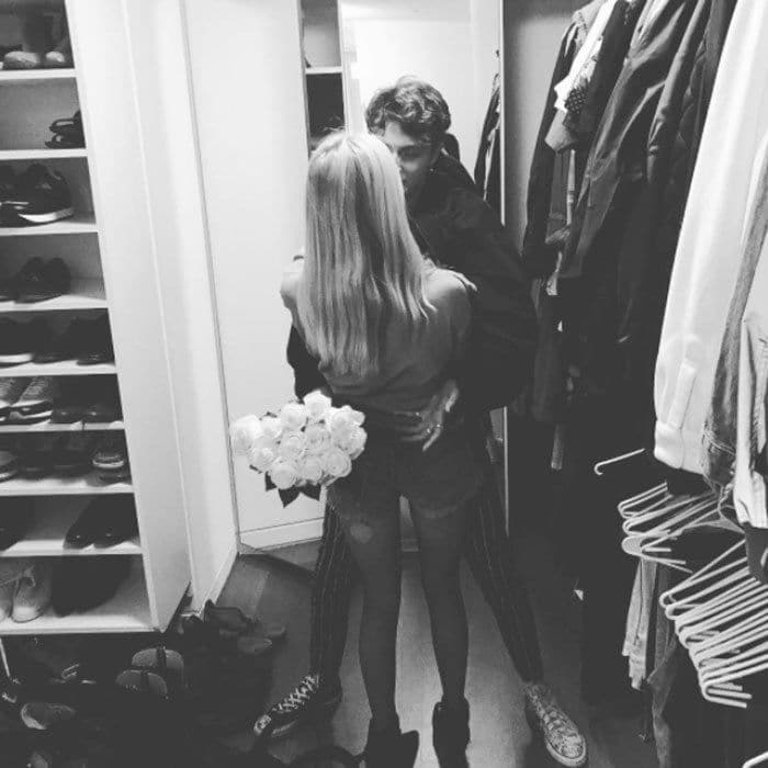 <b>Anwar Hadid and Nicola Peltz</b>
Gigi Hadid's younger brother is dating the daughter of billionaire businessman Nelson Peltz. Anwar confirmed the news on his Instagram account sharing a photo of himself and 'Bates Motel' actress Nicola hugging each other in a closet, while holding a bouquet of white roses. The budding model tagged his new girlfriend in the photo, which he captioned with puppy and rose emojis. Discussing her new beau recently with Women's Wear Daily, Nicola said, "Honestly, he is an angel. He's such an amazing person."
"He comes from such an amazing family," she added. "Gigi and Bella are so, so sweet. I just love his family so much. They're feminine, strong girls. To have that around is amazing."
Photo: Instagram/anwarhadid