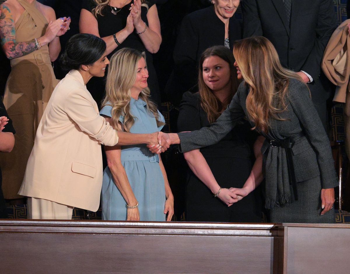 WASHINGTON, DC - MARCH 04:  First Lady Melania Trump shakes the hand of Second Lady Usha Vance ahead of U.S. President Donald Trump's address to a joint session of Congress at the U.S. Capitol on March 04, 2025 in Washington, DC. President Trump was expected to address Congress on his early achievements of his presidency and his upcoming legislative agenda. (Photo by Kayla Bartkowski/Getty Images)