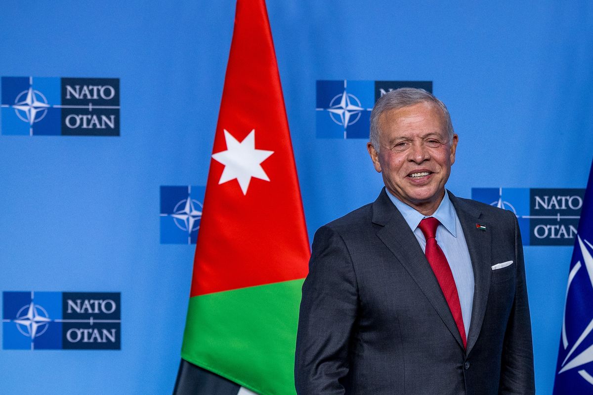 BRUSSELS, BELGIUM - DECEMBER 03: Jordan's King Abdullah II bin Al-Hussein stands in front of the press before the start of the first day of the NATO foreign ministers' meeting on December 03, 2024 in Brussels, Belgium. The meeting taking place from December 3-4 is chaired by the new NATO Secretary General, Mark Rutte, who is also hosting a visit with King Abdullah II of Jordan. (Photo by Omar Havana/Getty Images)